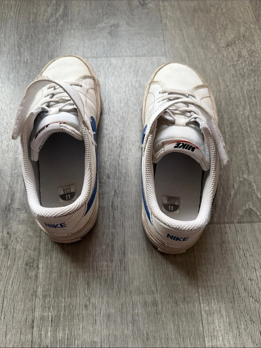 Nike Kids White Sneakers with Blue Swoosh